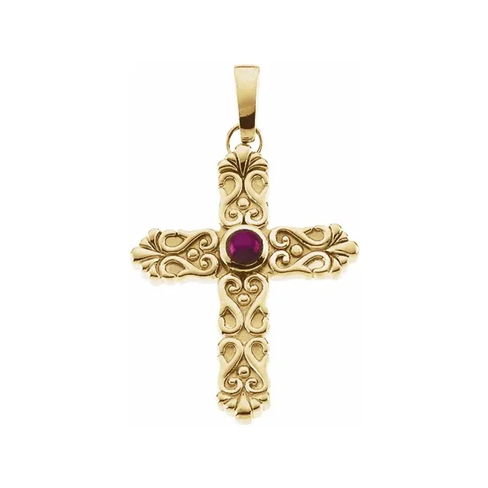 This beautiful decorative cross is crafted in polished 14K yellow gold and adorned with a beautiful, scrolled design with slightly pointed tips. A single, round lab-created star ruby cabochon is bezel-set in the center. 