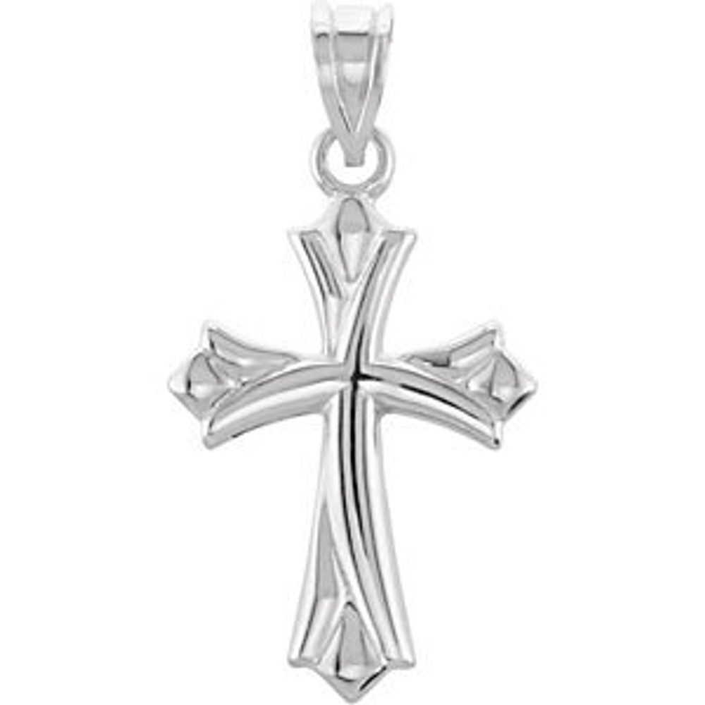 This hollow cross pendant styled in 14K gold is a sweet way to show devotion. Polished to a brilliant shine. Chain sold separately!