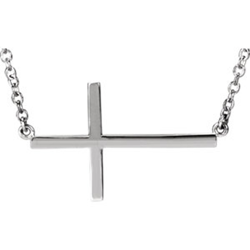 This sideways cross necklace is crafted from high-polished 14K white gold. The cross measures approximately 1-1/8" in length. The total length with the chain is 16" plus a 2" extension. Secured with a spring-ring clasp.