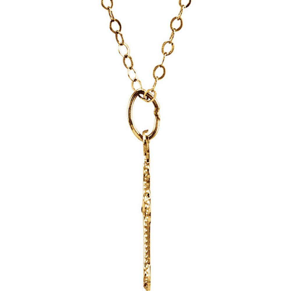 Delicate in design, this youth cross necklace is crafted in 14k yellow gold and measures 16.00x10.00mm.