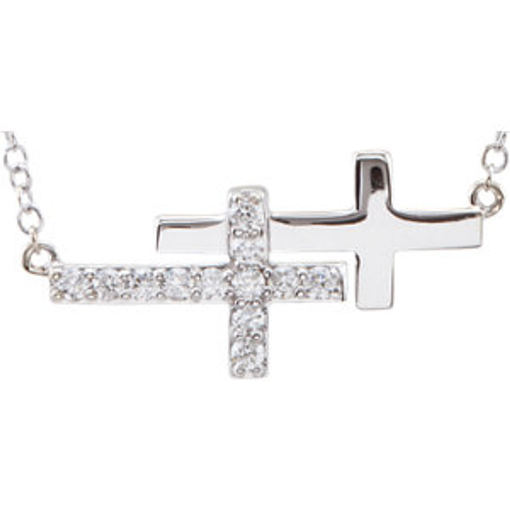 Inspiring and eye-catching, this sparkling diamond double sideways cross showcases beautiful 14k white gold with a 18" chain.