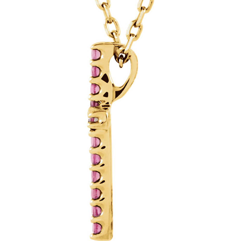 Inspiring and eye-catching, this sparkling Genuine Pink Tourmaline pendant showcases beautiful 14k yellow gold and matching 16" diamond cut cable chain necklace.