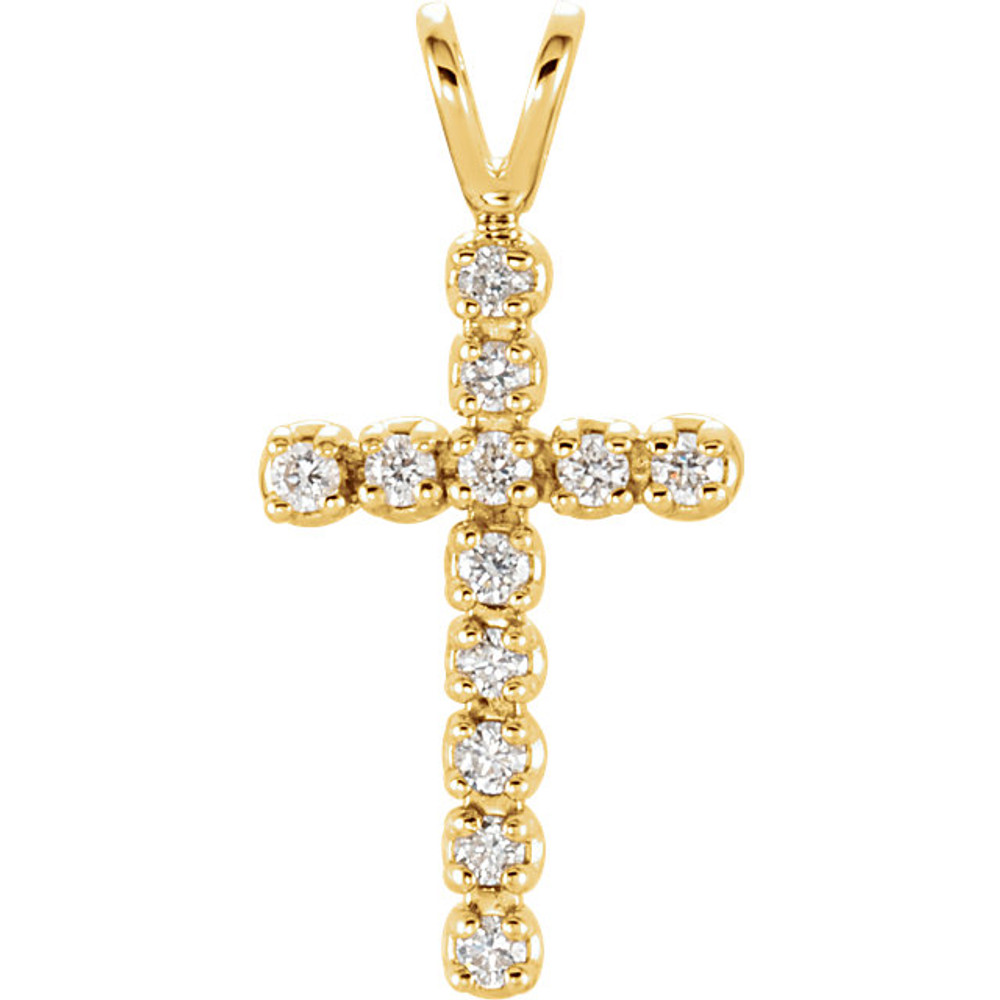 Diamond cross pendant in 14k gold measures 15.00x10.00mm and radiant with 1/8 ct. tw. Polished to a brilliant shine.