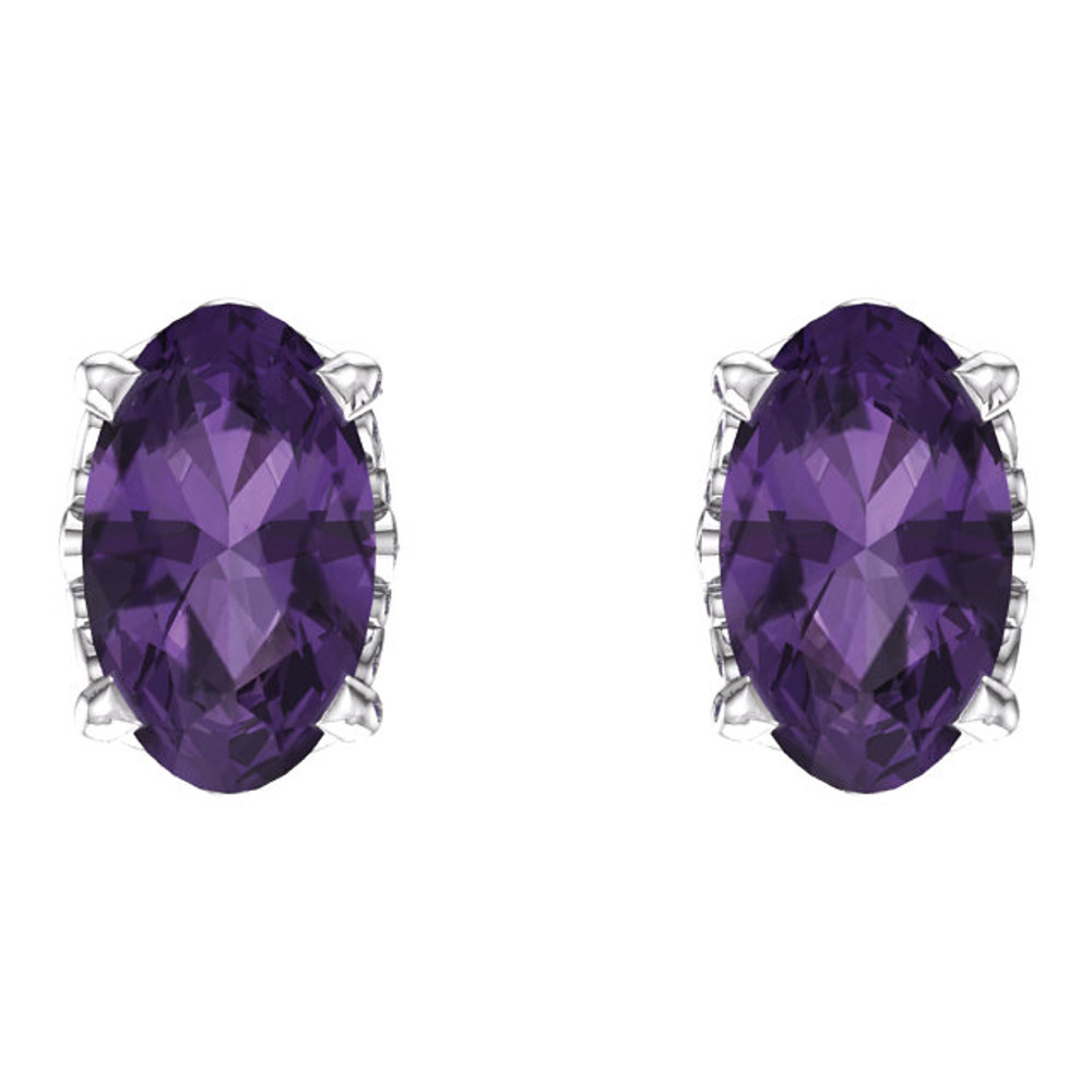 Purple passion! This simple stud design features a 5 x 3mm faceted genuine amethyst cradled in a 4-prong basket of 14k white gold finished with a tension back post. Total carat weight for the pair is 0.44. Color range varies on all natural stones so please allow for slight variations in shades. Gemstone treatment: heat enhanced.