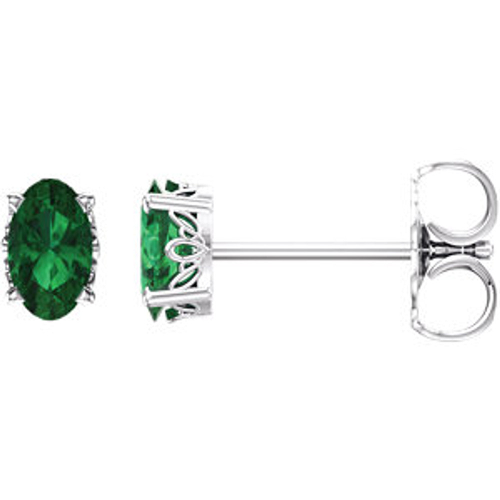 Lush with the dark green hue of nature itself, Emeralds pulse with vitality and are representative of life and excitement. This simple stud design features a 5 x 3mm faceted Chatham-created emerald cradled in a 4-prong basket of 14k white gold finished with a tension back post. Total carat weight for the pair is 0.40.