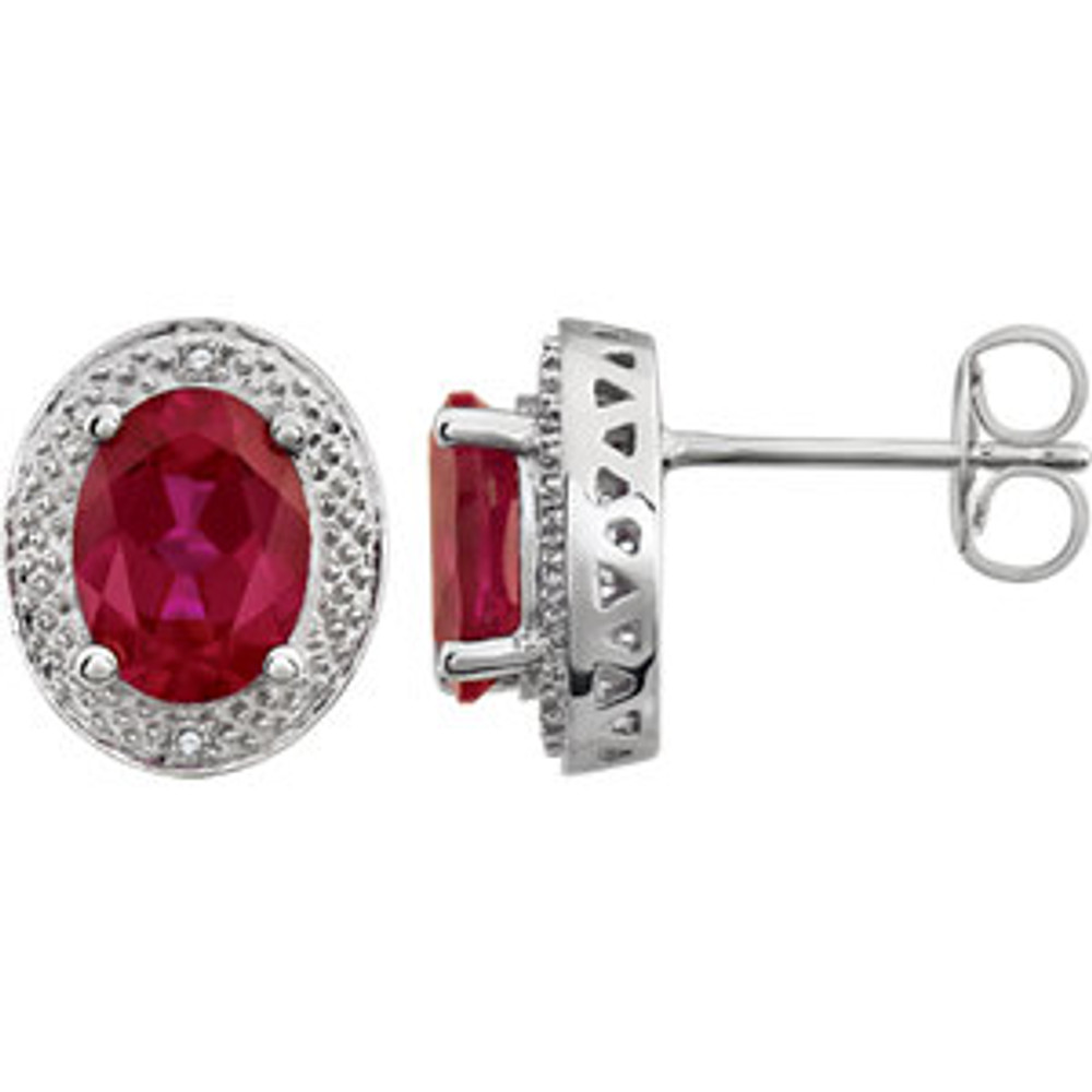 Created Ruby & .02 ct. tw. Diamond Earrings In 14K White Gold. Exceptional brilliance of enormous proportions. Slightly domed to catch light from every direction, these earrings make a stunning impression at first and second glance.
