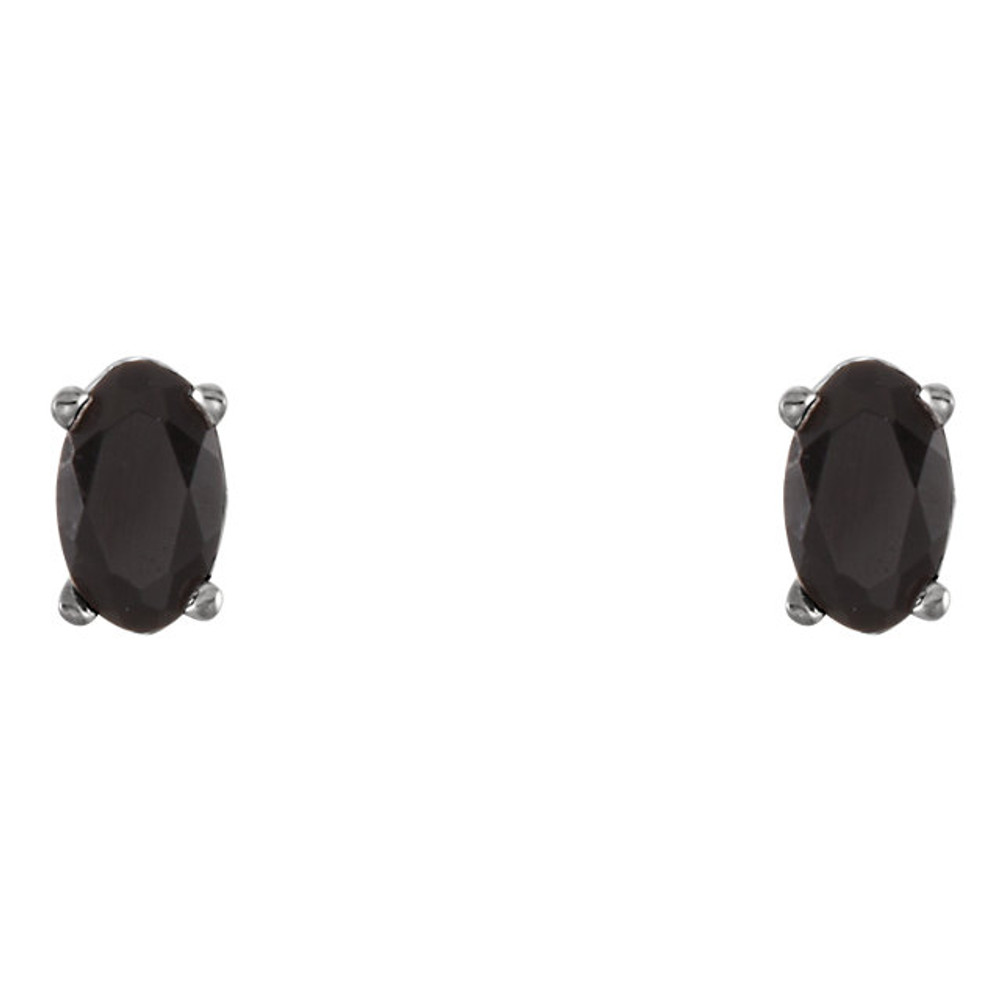 These oval genuine onyx earrings are set in 14K white gold. The posts of these fine jewelry earrings are secured by friction backs. Gently clean by rinsing in warm water and drying with a soft cloth.