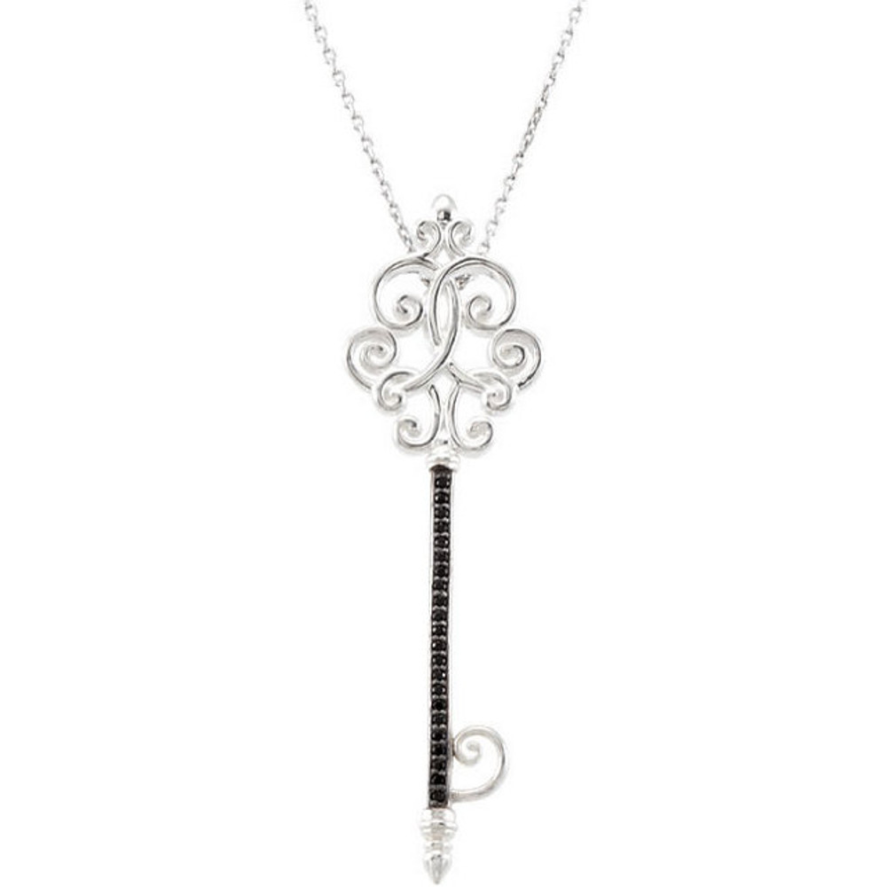 Stylish design key is crafted in rhodium plating 925 sterling silver pendant accented on the stem by black spinel of 1mm size. This key necklace is suspended from 18 inch sterling silver chain. Present her with the key to lock away in their hearts.