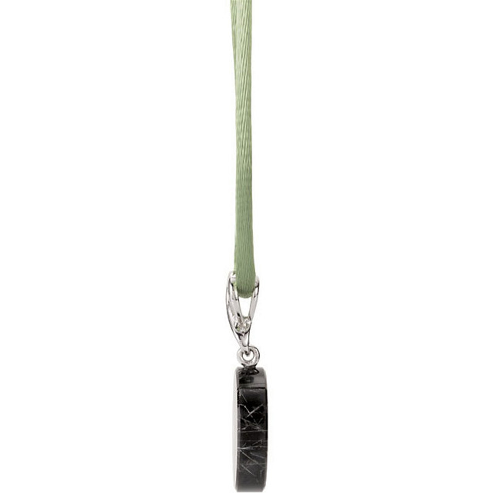 This sterling silver necklace features a 20.00mm Tourmalinated Quartz & Onyx gemstone and has a bright polish to shine. A 16.50 inch sterling silver green silk necklace is included.