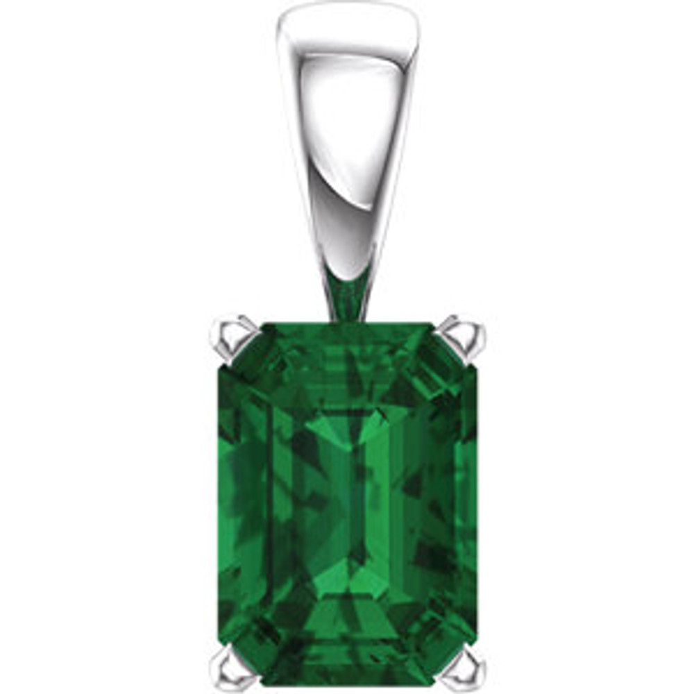 This solitaire pendant proudly displays one octagon-cut sparkling green emerald gemstone, and would make the perfect anniversary, birthday, or holiday gift.