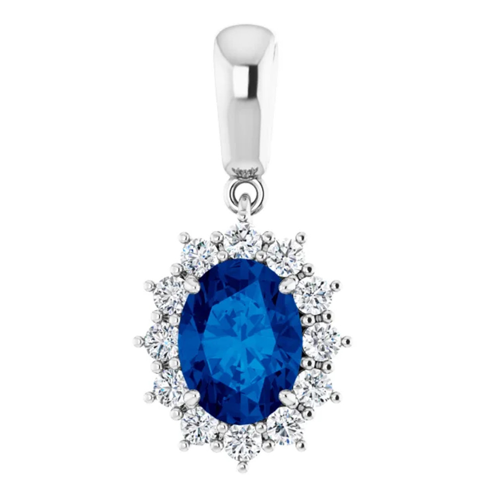 This gorgeous gemstone and diamond pendant features a 8x6mm oval shaped Blue Sapphire that is surrounded by brilliant cut round diamonds in a halo fashion. You'll love wearing it again and again.