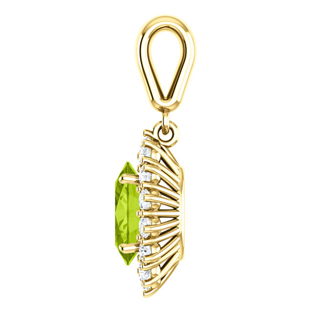 Elegant in every way, this peridot and diamond pendant features a single peridot framed by fourteen round diamonds in 14k yellow gold with a matching cable chain necklace.