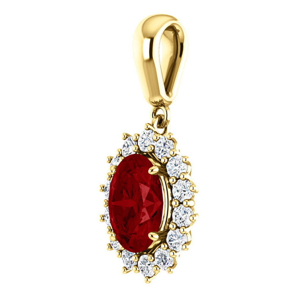 Brilliant in every way, this gemstone and diamond pendant features a vivid ruby surrounded by sparkling diamonds set in 14k yellow gold with a matching cable chain necklace.
