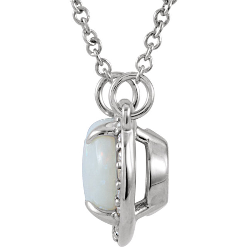 Basic and beautiful, this pendant elevates any look. Created in 14k white gold s, a beautiful frame set with shimmering white diamonds surrounds an 9.0x7.0mm genuine opal center stone. A regal look, this stylish pendant is polished to a brilliant shine and suspends along an 16.0-inch solid cable chain that secures with a spring-ring clasp.