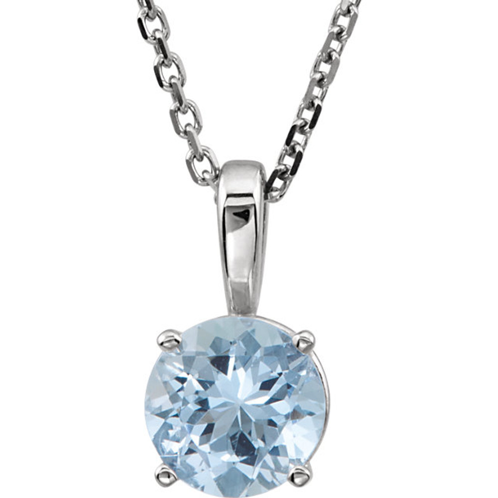 This breathtaking pendant features a 3mm round shaped imitation blue zircon, set in 4 prong 14kt white gold. Also available with other gemstones.