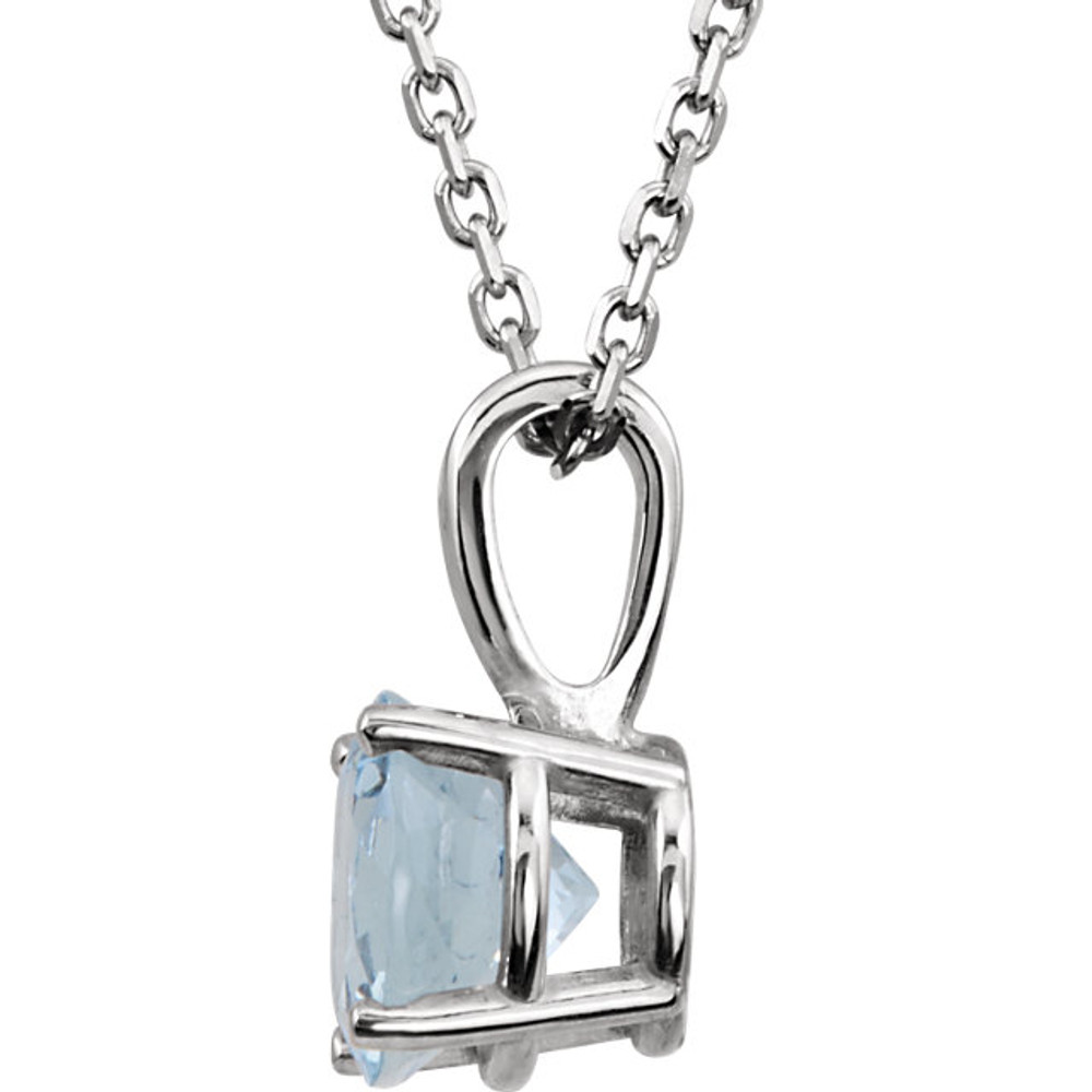 This breathtaking pendant features a 3mm round shaped imitation blue zircon, set in 4 prong 14kt white gold. Also available with other gemstones.