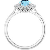 Dainty and feminine, this gemstone ring sets an elegant tone. The ring is set in platinum.
