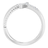 Faith meets fashion in this diamond cross ring.