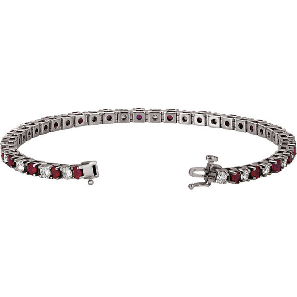 This 14k white gold 7.25" bracelet features twenty three 3mm genuine and natural rubies accented by 23 brilliant cut round near-colorless diamonds of G-H Color and I1 Clarity. The colored precious gemstones and shiny diamonds are set in a prong setting.