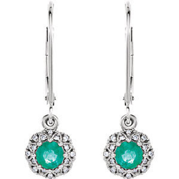 You'll feel like royalty in these breathtaking genuine emerald drop earrings, enhanced by .08 ct. t.w. diamonds in a platinum setting.