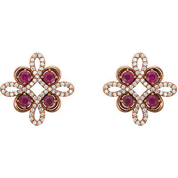 Beautiful 14k rose gold clover earrings featuring eight gorgeous rubies and 1/4 total carat weight of diamonds.