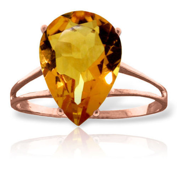 All eyes will be on your gorgeous hands when you hold that Cosmopolitan and this ring reflects in the candlelight of a cocktail party or dinner date that you have so looked forward to. This 14K gold Ring with Natural Citrine features a showy pear shaped five carat Citrine gemstone that is faceted just right. The stone is set on a unique, airy, 14K gold band. Measuring 27.9mm in height and 14mm in width, this ring will be a real conversation piece. Grab it now so it will be ready and waiting for your next big event.