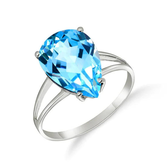 Let your hands do the talking when you display this amazing 14k gold ring with natural blue topaz for all of the world to see. A simple gold band, made in your choice of yellow, white, or rose gold, is given a unique look with an open design that fully emphasizes the beauty of the stunning stone that it holds. The natural blue topaz weighs an incredible five carats, making it large enough to make a bold statement and give off plenty of color. This ring makes a fabulous addition to any wardrobe, as well as being a great birthstone piece for December birthday celebrants.