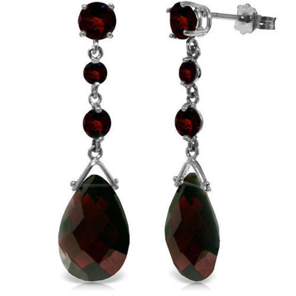 Show off a classic with these garnet gemstone earrings, framed in 14k gold.