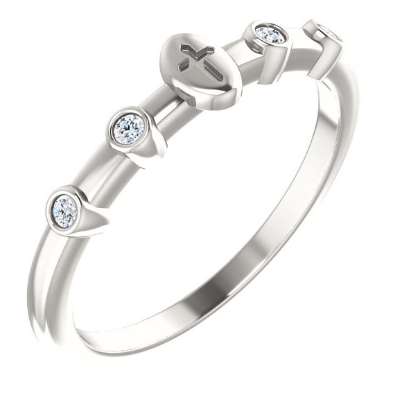 Stackable Expressions is a simple and stylish assortment of rings that can be worn together to express your style, your family and your personality. This exquisite ring is a beautiful expression of your faith. Fashioned in fine sterling silver, this ring is topped with a traditional cross set with .06 ct. t.w. of shimmering diamonds. Polished to a brilliant shine, this ring adds a meaningful touch to your personal stack.