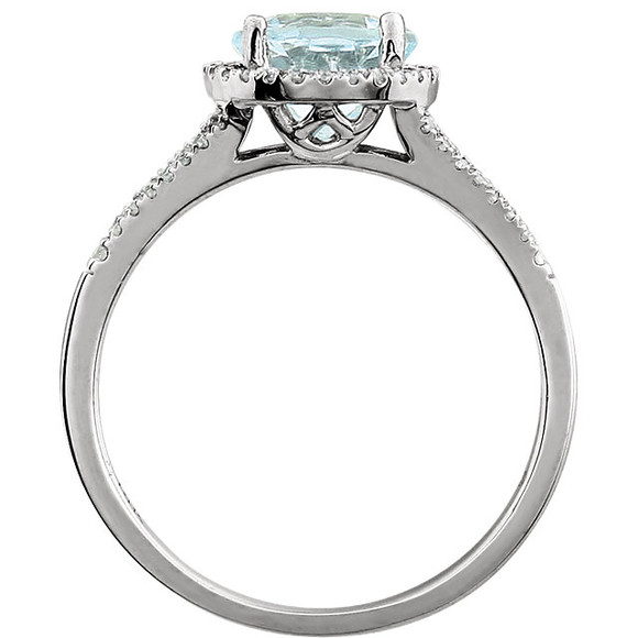 Beautiful Halo-style Gemstone Ring in 14K White Gold featuring a Natural Aquamarine Gemstone & Diamonds. The ring consist of 1 Round Shape, 7.0 mm, Aquamarine Gemstone with 56 Accent genuine Diamonds. This ring is both Elegant and Classic - Perfect for everyday. The inherent beauty of these gems make this an ideal way for you to show your love to someone you care for.