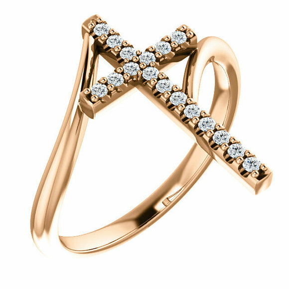 Share your faith for all to see with this sparkling diamond cross ring. Certain to become a treasured favorite, this ring captivates with 1/8 ct. t.w. of diamonds and a polished shine. Diamonds are G-H in color and I1 or better in clarity.