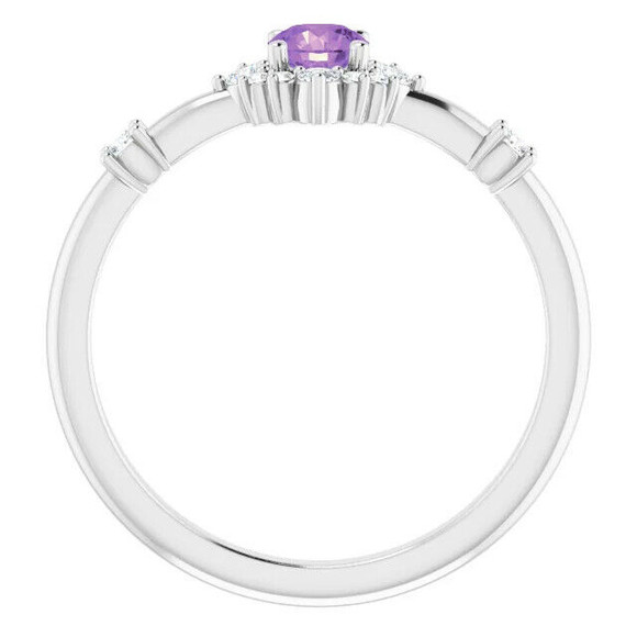A classic accessory representing her February birthday, this sophisticated gemstone ring makes any occasion special.