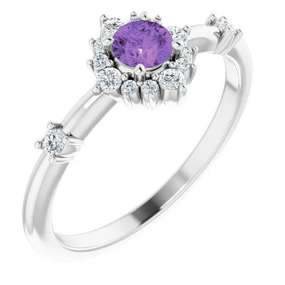 Marvel her with the details of this gorgeous gemstone and diamond ring.