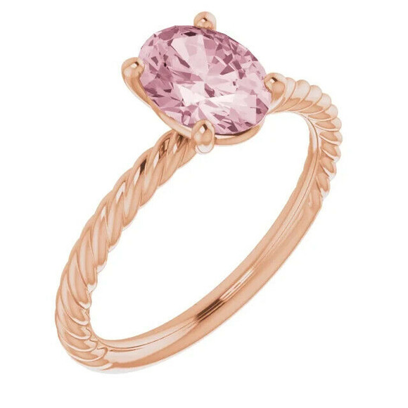 Create a playful look you can wear with anything with this lovely oval-shaped pink morganite ring.