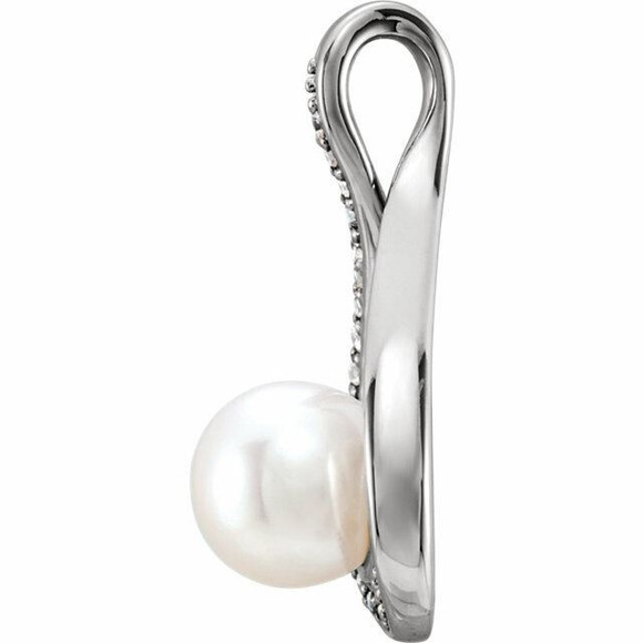 A brilliant look, this pearl fashion pendant transitions perfectly from day into evening. Fashioned in platinum, this clever design features an 6.0-6.5mm cultured freshwater pearl center stone surrounded by shimmering round diamonds. Polished to a brilliant shine.