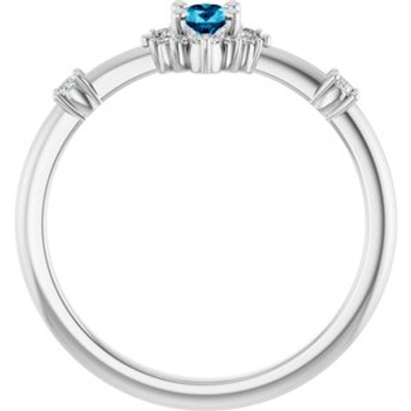 Dainty and feminine, this gemstone ring sets an elegant tone. The ring is set in platinum.