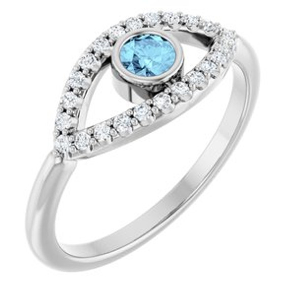 Dainty and feminine, this gemstone ring sets an elegant tone. The ring is set in platinum.