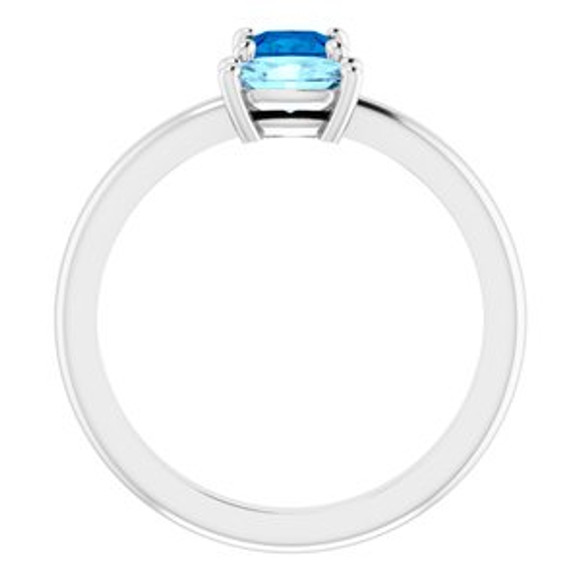 Dainty and feminine, this gemstone ring sets an elegant tone. The ring is set in platinum.