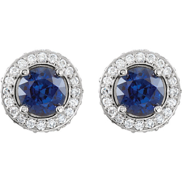 Sapphires prized for their intense velvety color and the calming influence of blue has made it an enduring symbol for loyalty and trust, which also makes it the perfect gift to represent a faithful and steadfast commitment. This stunning 8.5mm stud design features a 5mm genuine blue sapphire emphasized by an entourage of white diamonds. The faceted sapphires have a combined weight of 1.4 carats. The round diamonds are 1mm in size, I1 in clarity, G-H in color and have a total weight of 3/8 carat. The Color range varies on all natural stones so please allow for slight variations in shades.