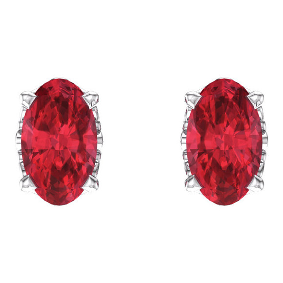 Fiery and romantic! This simple stud design features a 5 x 3mm faceted Chatham-created ruby cradled in a 4-prong basket of 14k white gold finished with a tension back post. Total carat weight for the pair is 0.60.