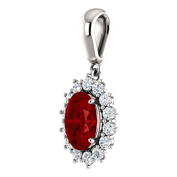 Brilliant in every way, this gemstone and diamond pendant features a vivid ruby surrounded by sparkling diamonds set in 14k white gold.