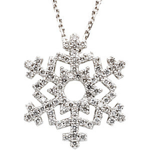 This beautiful and modern diamond pendant for women features brilliant-cut bright round diamonds set in a sparkling 14kt white gold prong setting. This nature themed pendant is uniquely shaped as a snow flake.