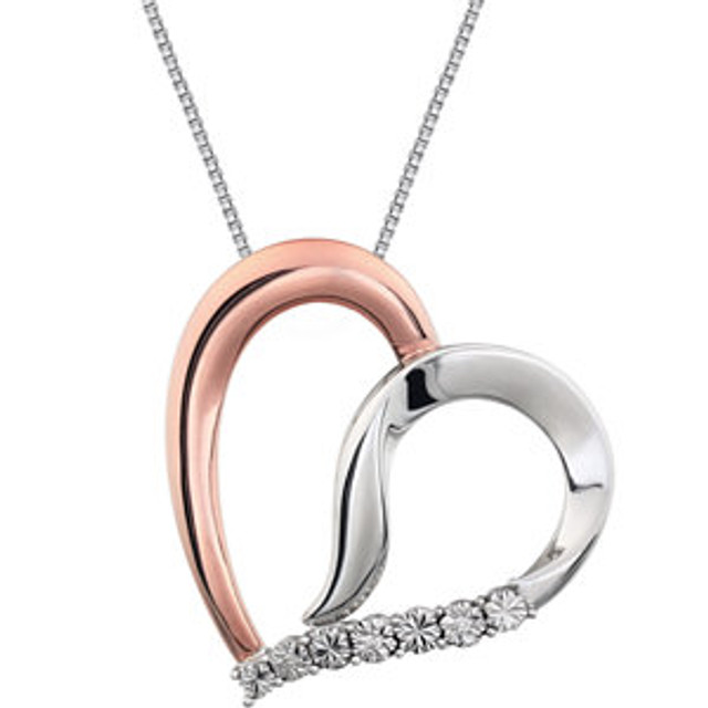 This 14K Rose Gold/Sterling Silver pendant features a romantic heart with round cut diamonds. Diamonds are .02ctw, G-I in color, and I3 or better in clarity. Pendant is presented on an 18 inch sterling silver rope chain.