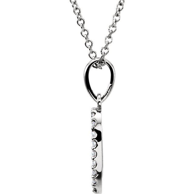 Beautiful 14Kt white gold heart necklace features a single white shimmering diamond with 1/8 carats hanging from a 16" inch cable chain which is included.