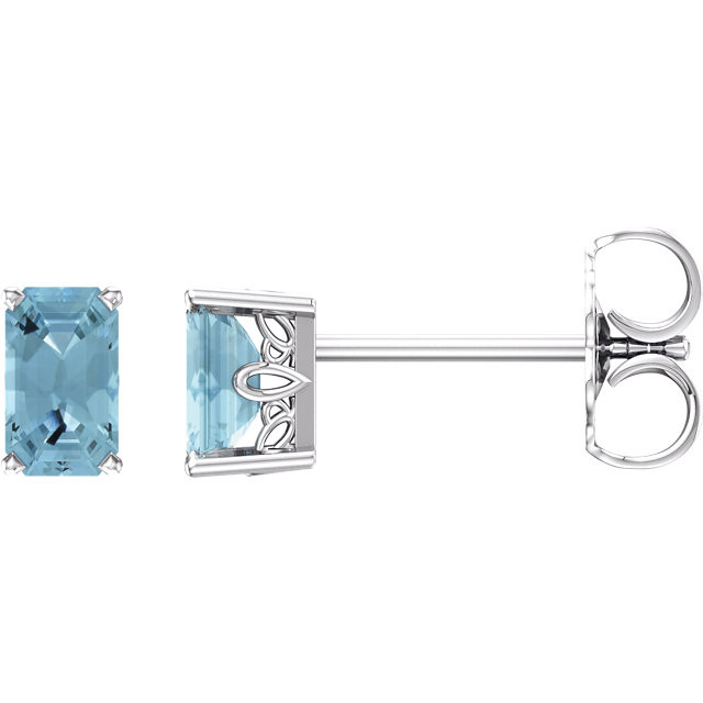 These lovely 14k white gold earrings each feature a genuine 5 x 3mm Emerald/Octagon aquamarine. Polished to a brilliant shine.