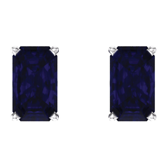 These lovely 14k white gold earrings each feature a created 5 x 3mm Emerald/Octagon blue sapphire. Polished to a brilliant shine.
