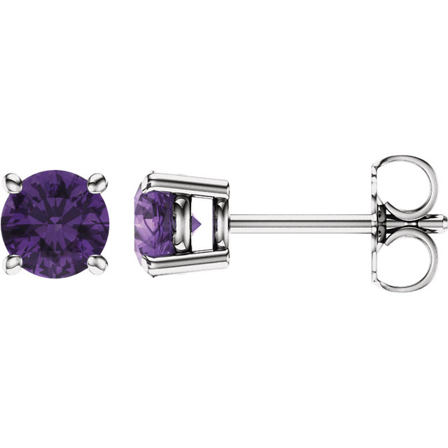 Sparkling and timely, these hand-selected gemstone earrings feature vivid purple amethyst gemstones set in 14k white gold four-prong settings.