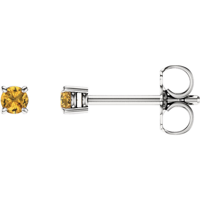 Deeply rich in color, these yellow sapphire earrings are complemented by 14k white gold four-prong settings and make a simply striking gift.