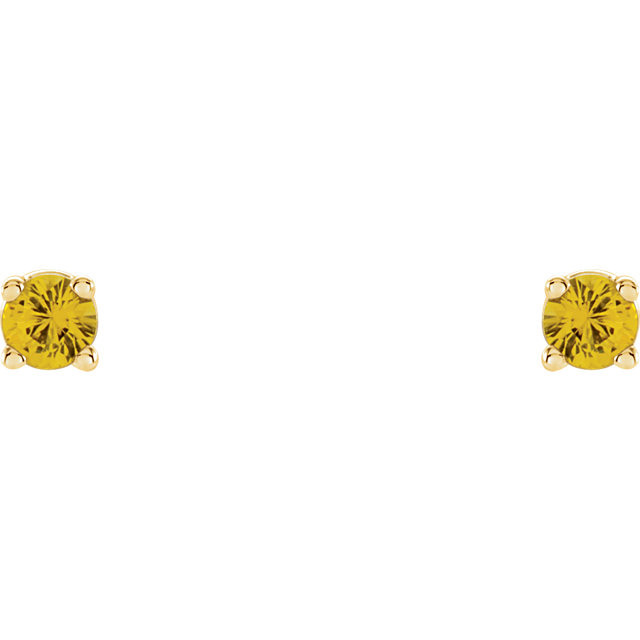 Deeply rich in color, these yellow sapphire earrings are complemented by 14k yellow gold four-prong settings and make a simply striking gift.