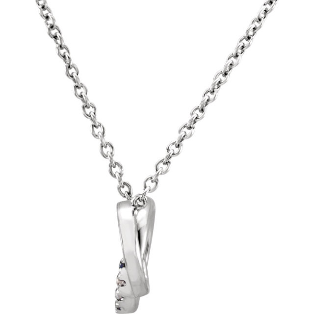 This 14k white gold necklace features two interlocking diamond adorned loops. Diamonds are .06ctw, J or better in color, and I2 or better in clarity. Pendant is 7.6mm in length and 11mm in width and is displayed on an 18inch chain.